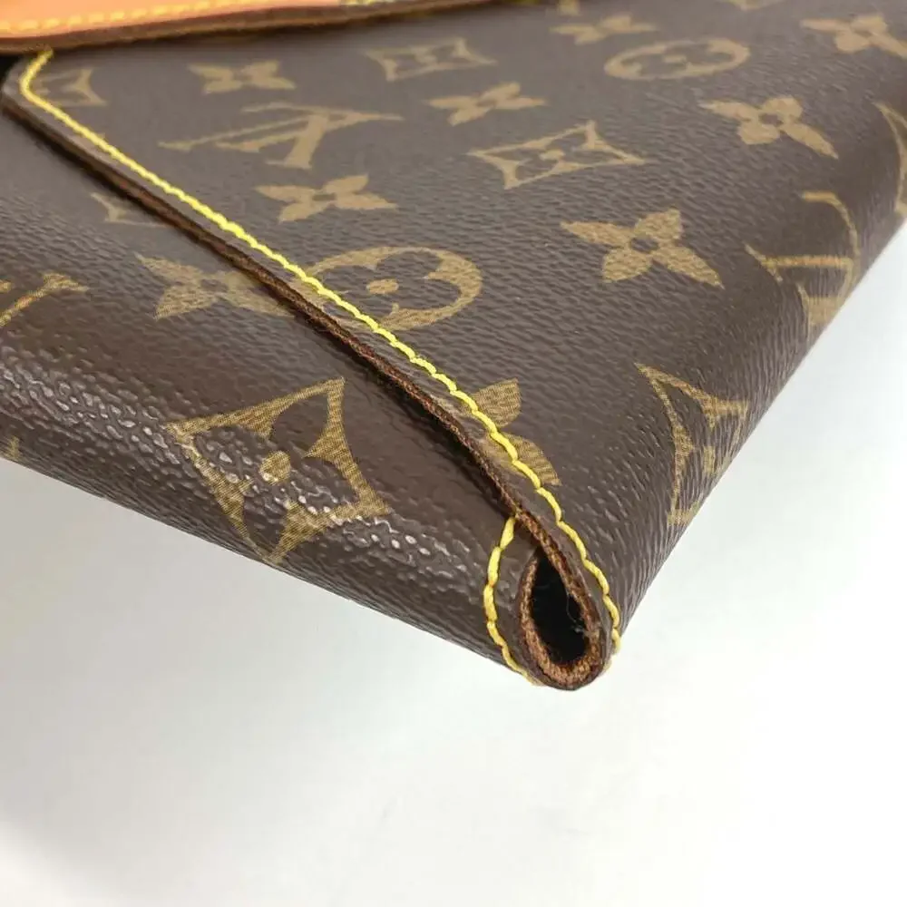 LOUIS VUITTON Brown Monogram Canvas Clutch Bag